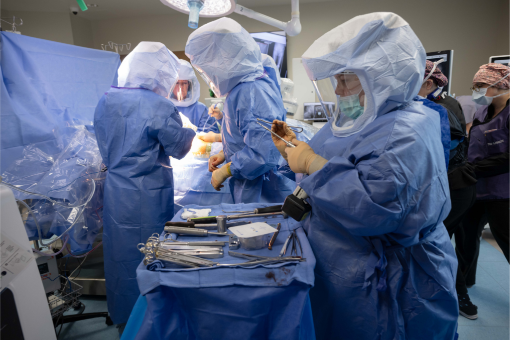"OR-ASSI team performing a surgical procedure in the operating room, prioritizing patient safety and operational precision."