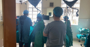Medical team performs surgery in a resource-limited hospital setting—demonstrating real-world medical solutions for global healthcare access.